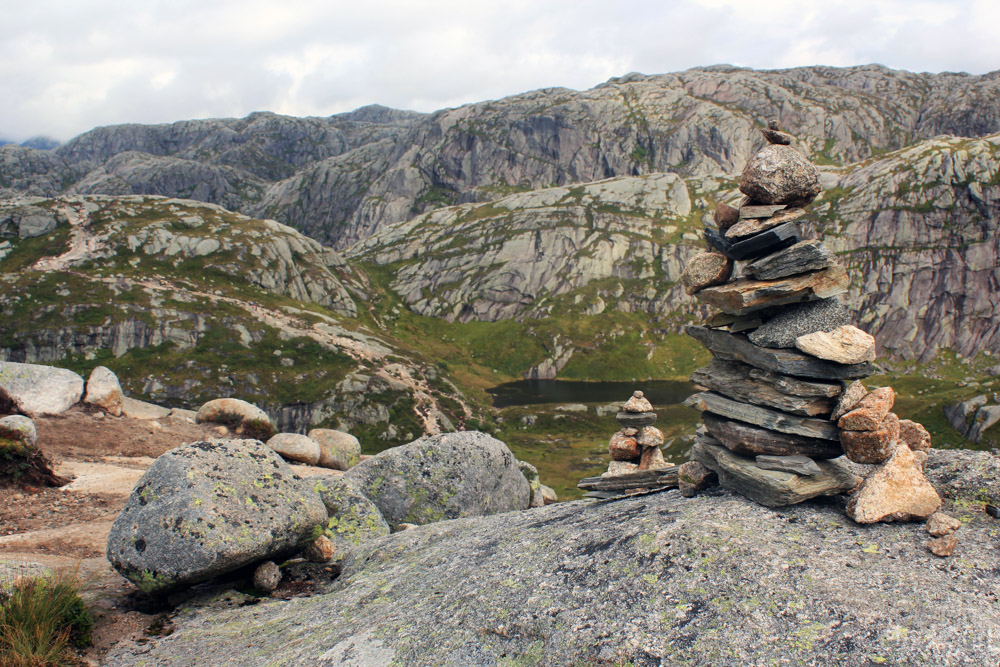 Rock piles on scenery on hike to Kjeragbolten in Norway