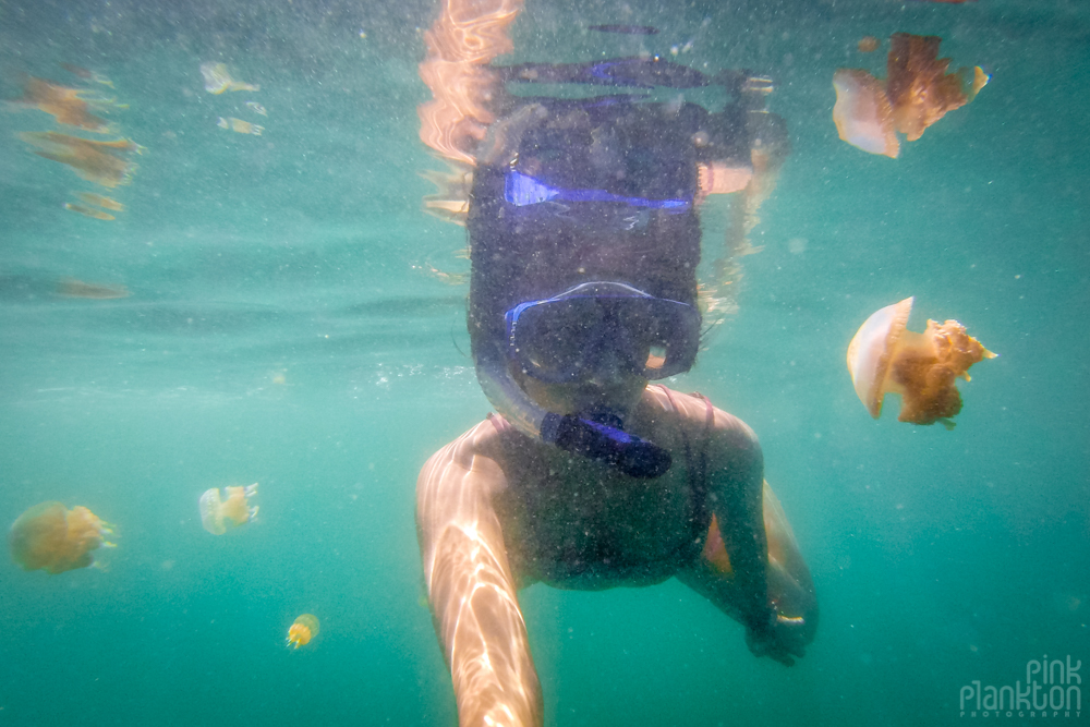 girl snorkeling in jellyfish lake in Togean Islands, Sulawesi, Indonesia