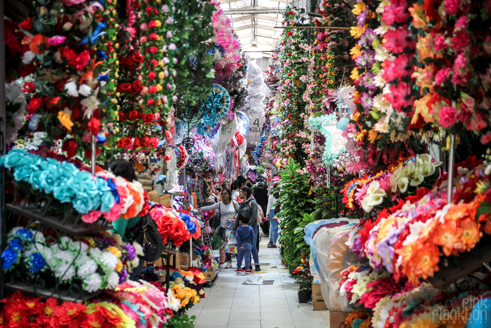 artificial flower aisle and party decorations in Mexico City's Mercado de Flores Merced