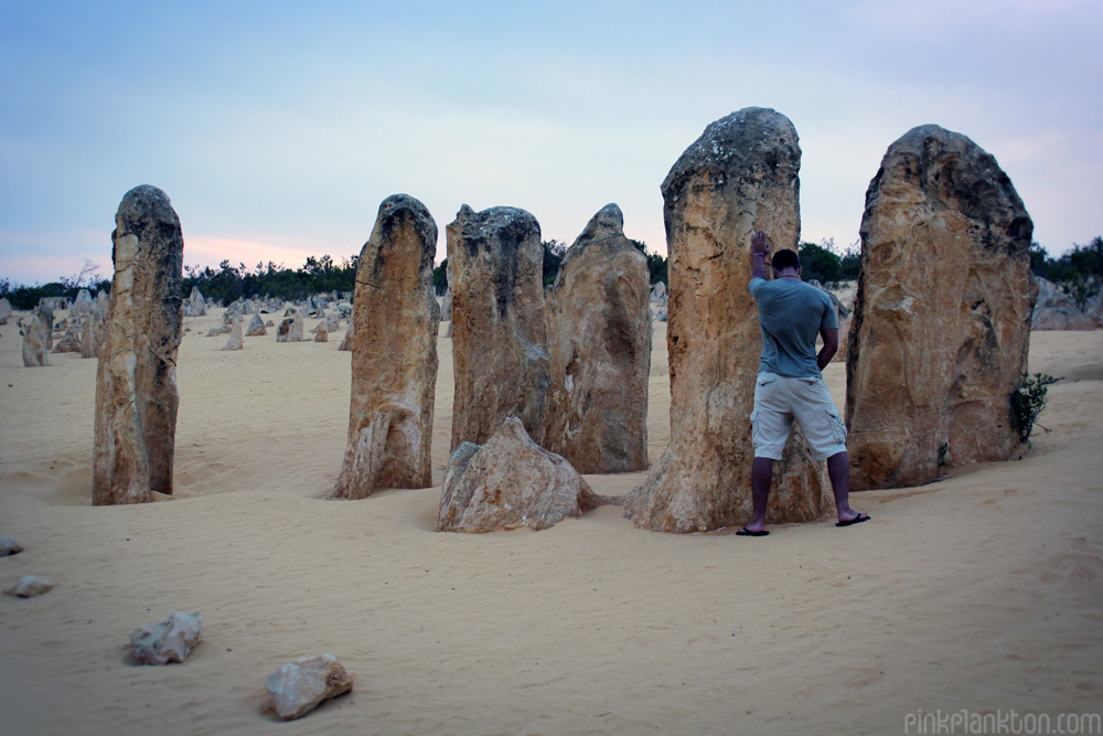 Man peeing in the Pinnacle Dessert, Western Australia