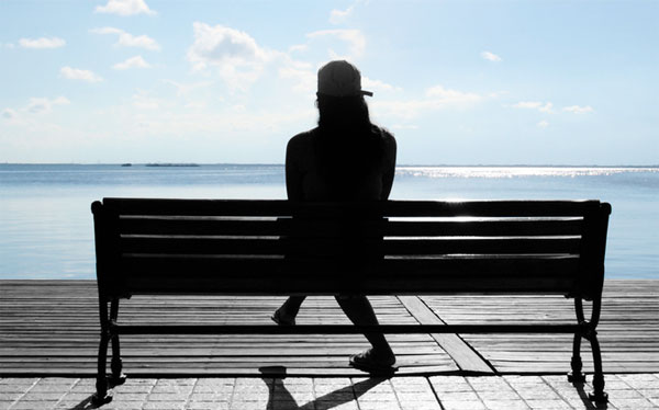 girl sitting on bench