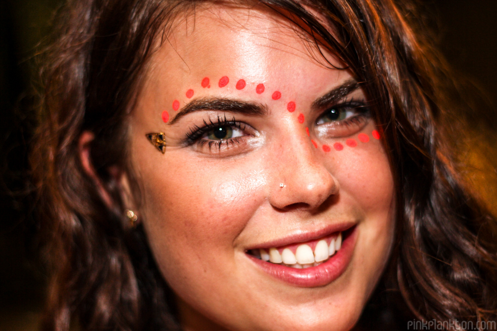 girl with facepaint at full moon party in Koh Phangan, Thailand