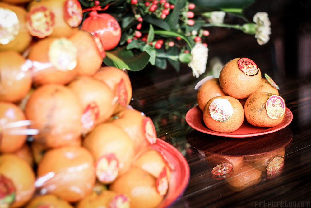 Chinese New Year orange offerings in temple