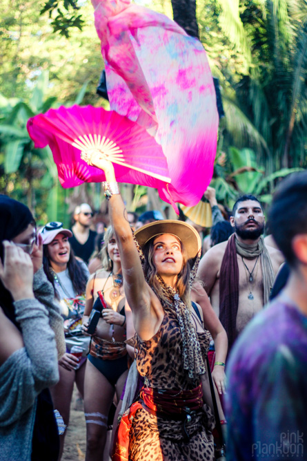 Envision Festival girl with silk fan on dancefloor