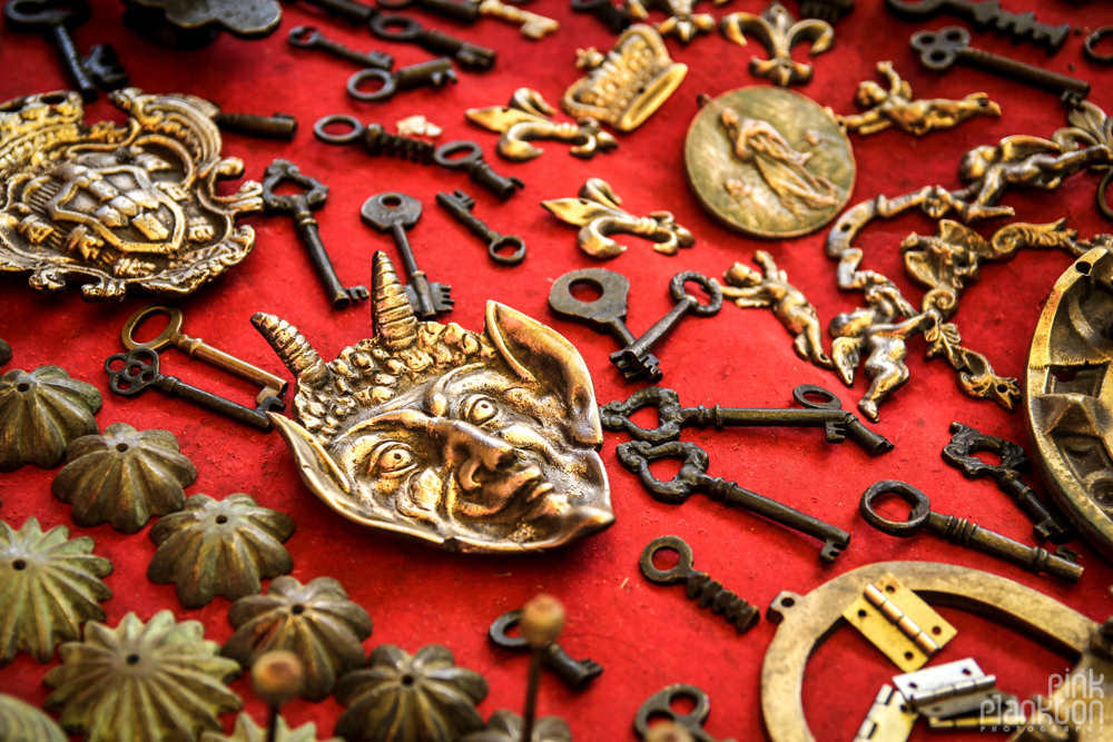 antique brass figurines and keys in Mercado La Lagunilla in Mexico City