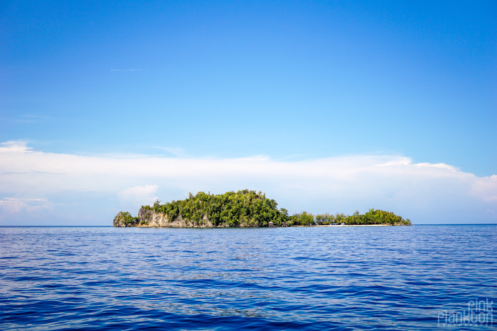 island of Fadhila Cottages in the Togean Islands from afar