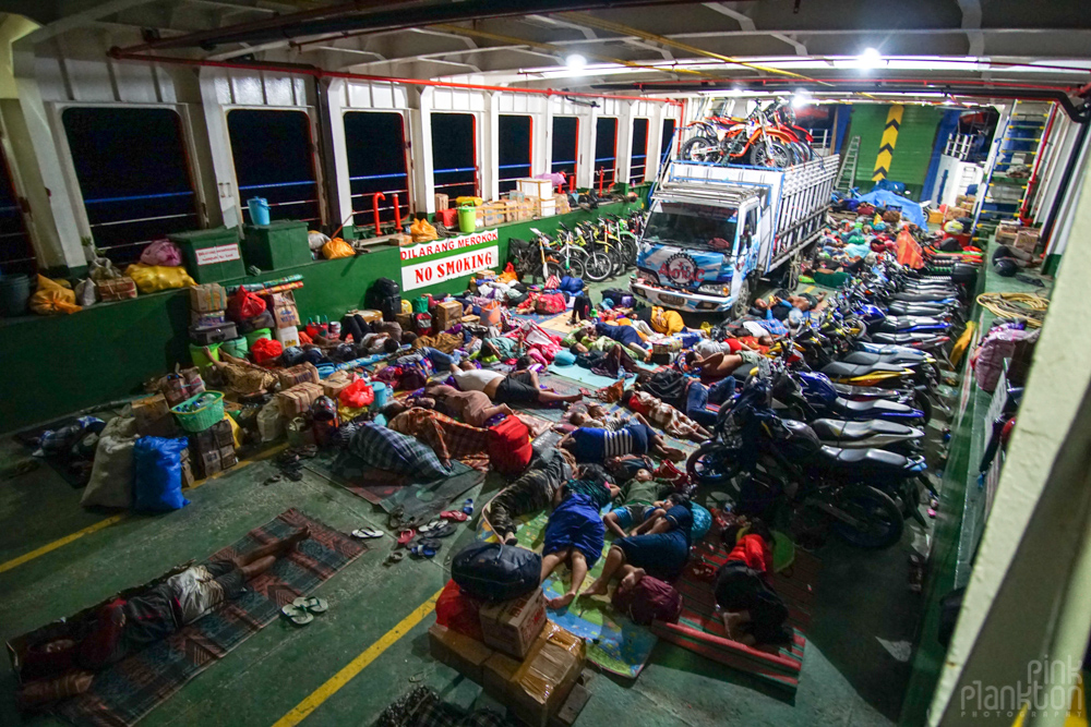 passengers in cargo area of overnight ferry from Togean Islands to Gorontalo