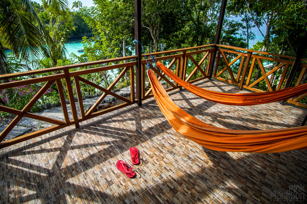 hammocks and bungalow in the hill of Sera Beach in the Togean Islands