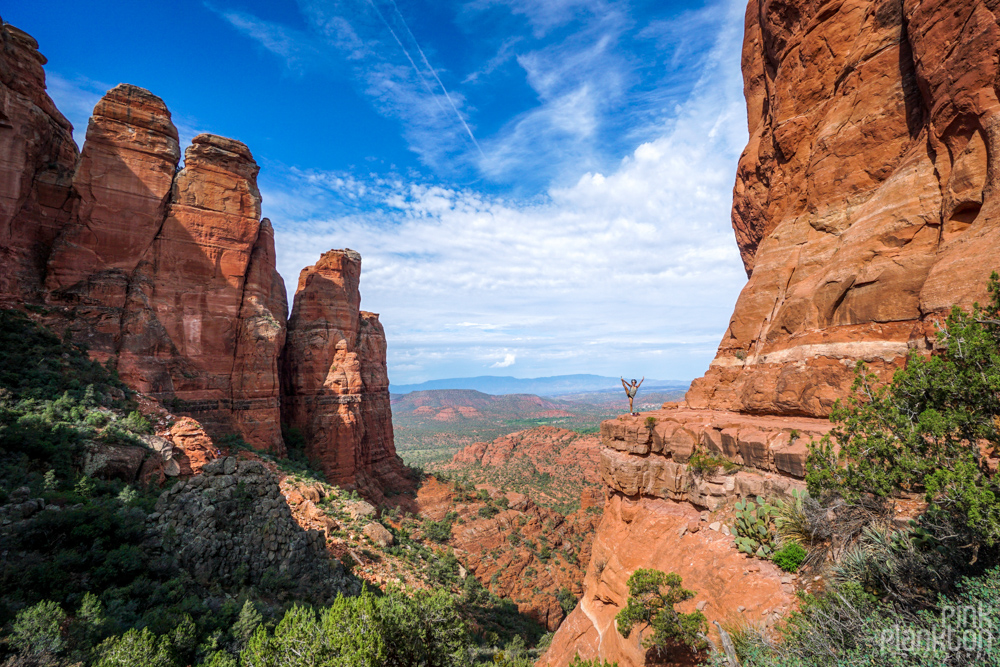 girl doing yoga pose on Cathedral Rock in Sedona