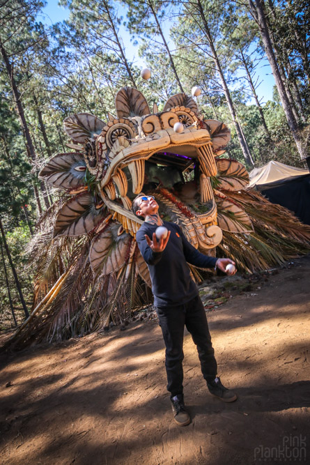 juggler in front of main stage at Festival Psycristrance