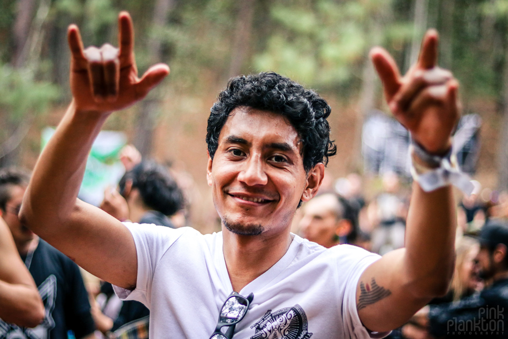 man with hands up at Festival Psycristrance