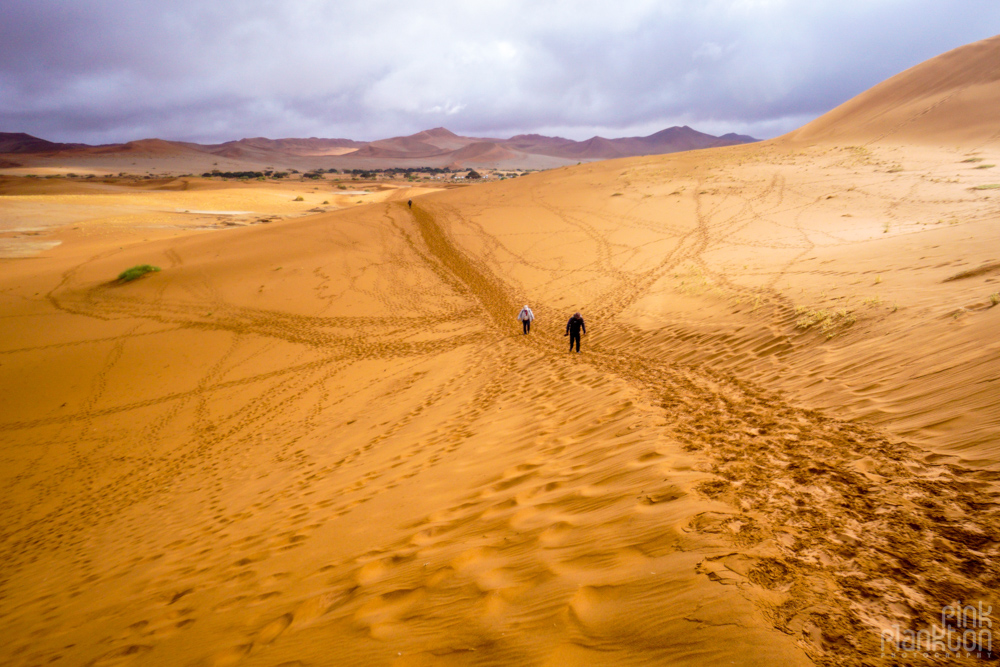 hiking the sand dunes in Sossusvlei, Namibia