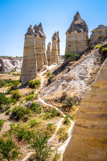 path and penis-shaped rock formations in Love Valley in Cappadocia, Turkey