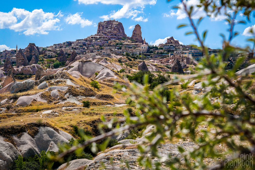 View of Uchisar Castle from afar in Cappadocia, Turkey