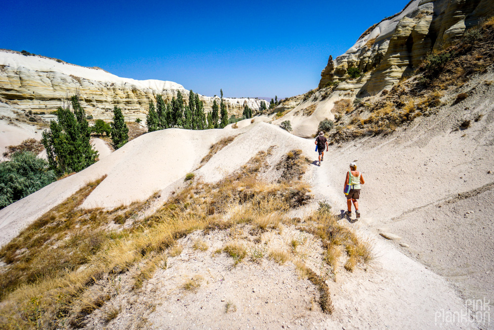 Hikers in White Valley in Cappadocia, Turkey