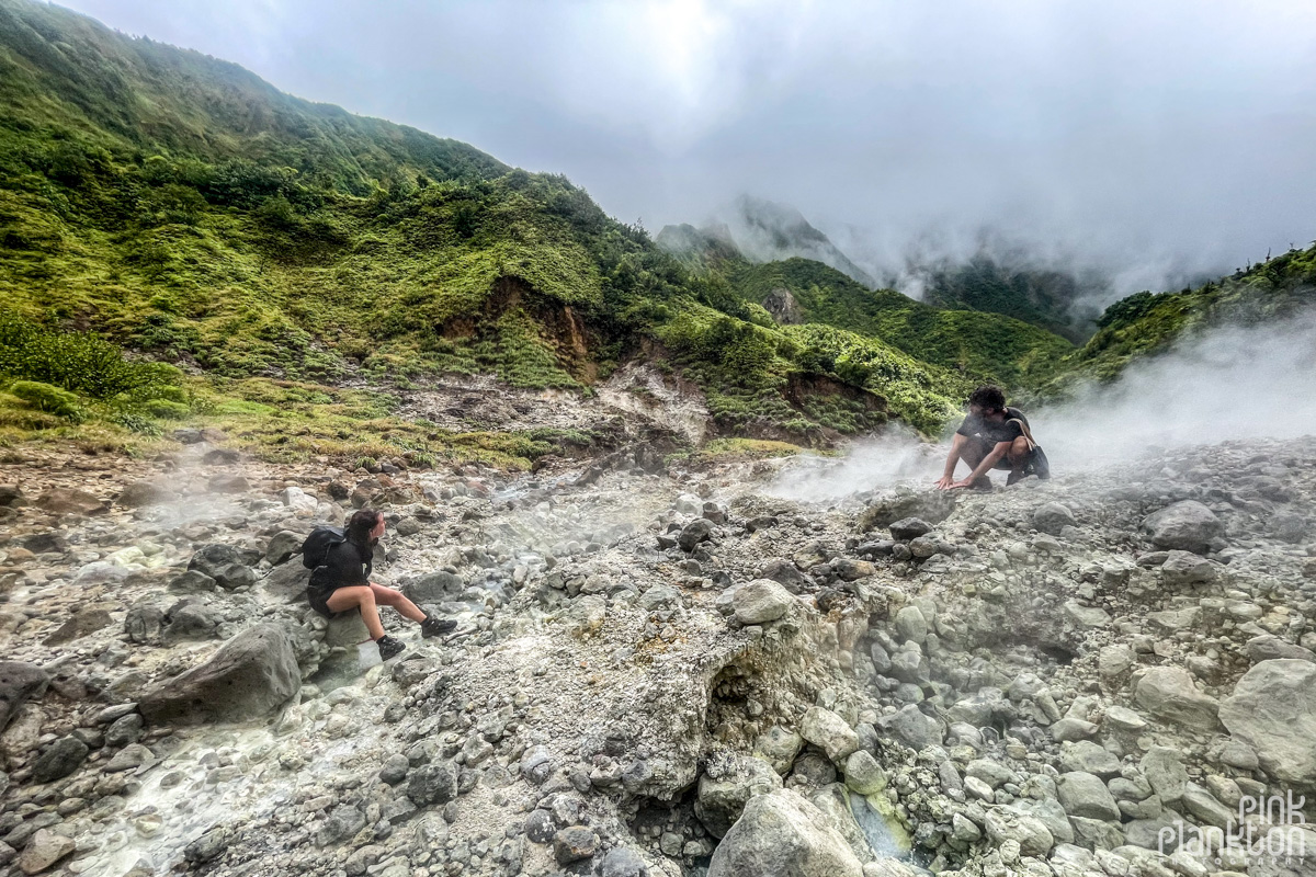 Two hikers in the Valley of Desolation along the Boiling Lake Hike in Dominica