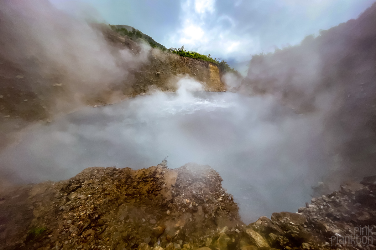 Steam rising from the Boiling Lake in Dominica