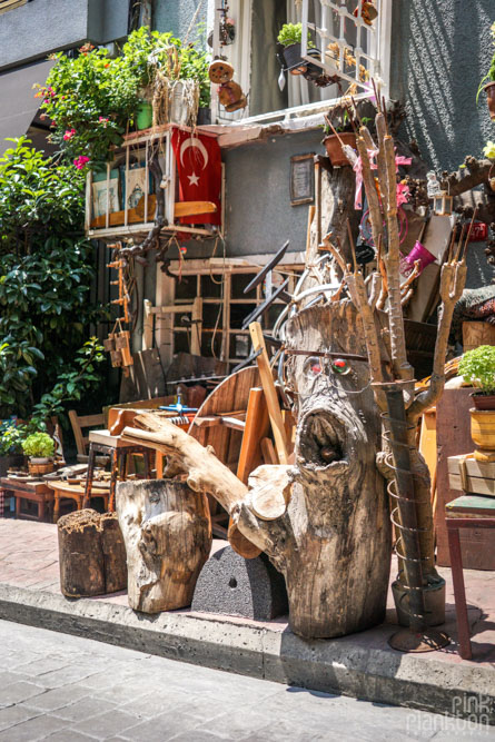 Random antique artifacts on the street in Brass antique statue on the streets of Cihangir, Istanbul