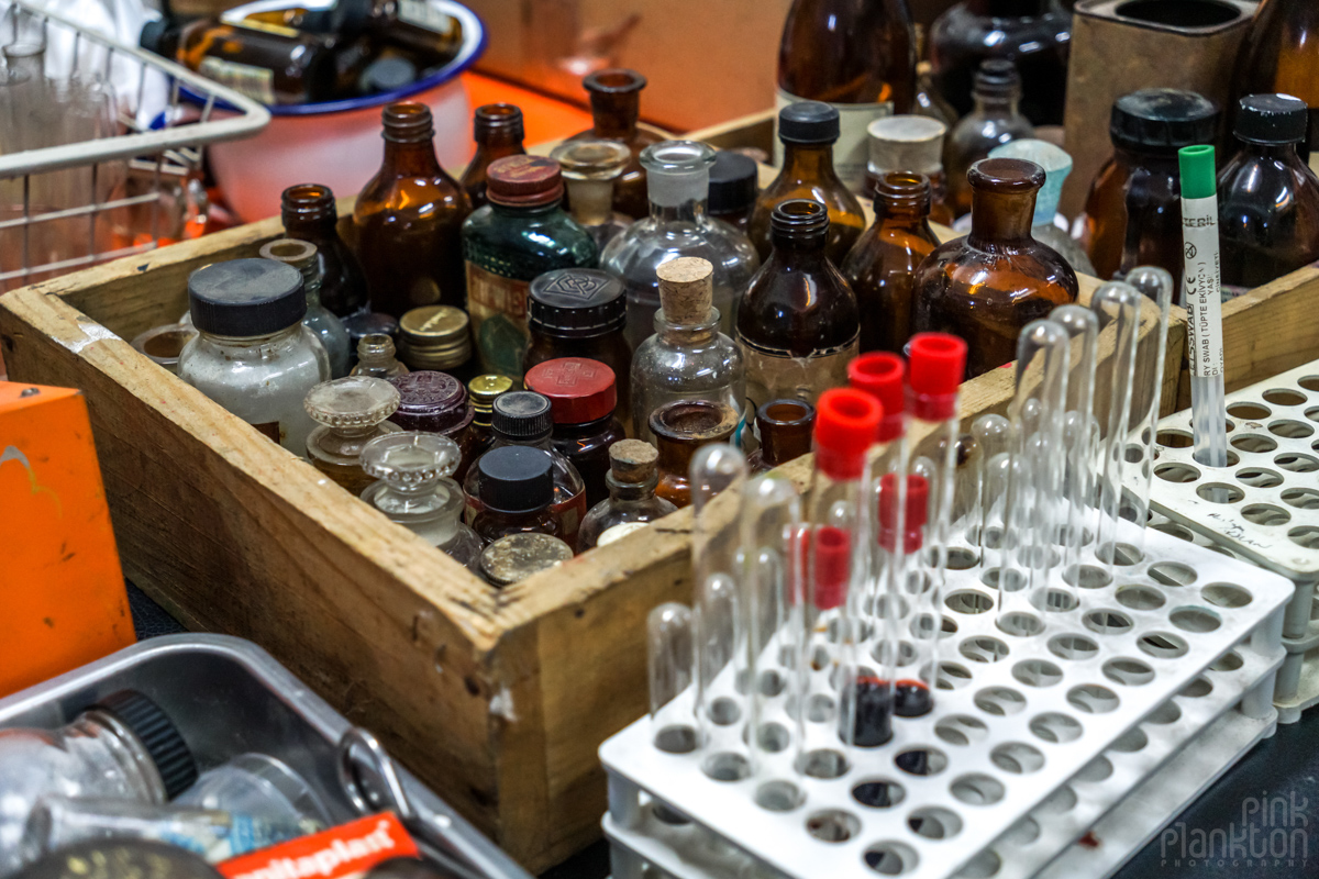 Old medical lab bottles and tubes at Plato Platonik in Istanbul