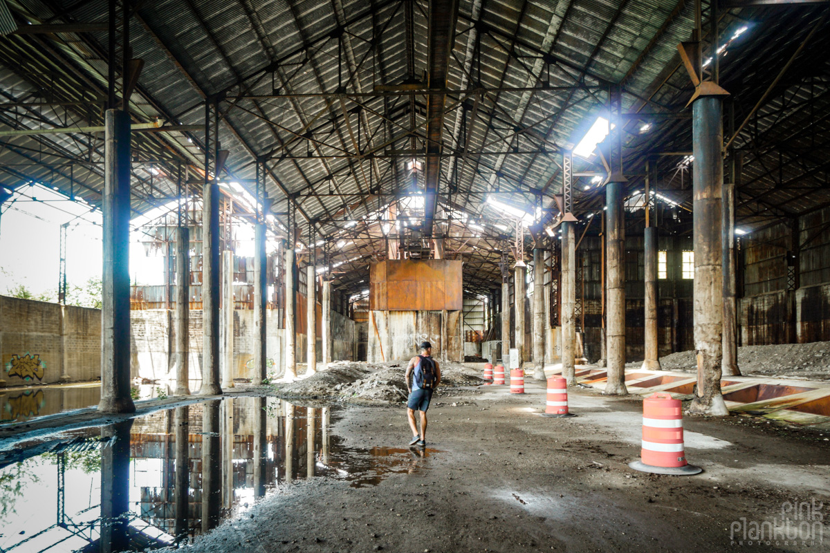 Male exploring inside an abandoned sugar mill in Guanica Puerto Rico