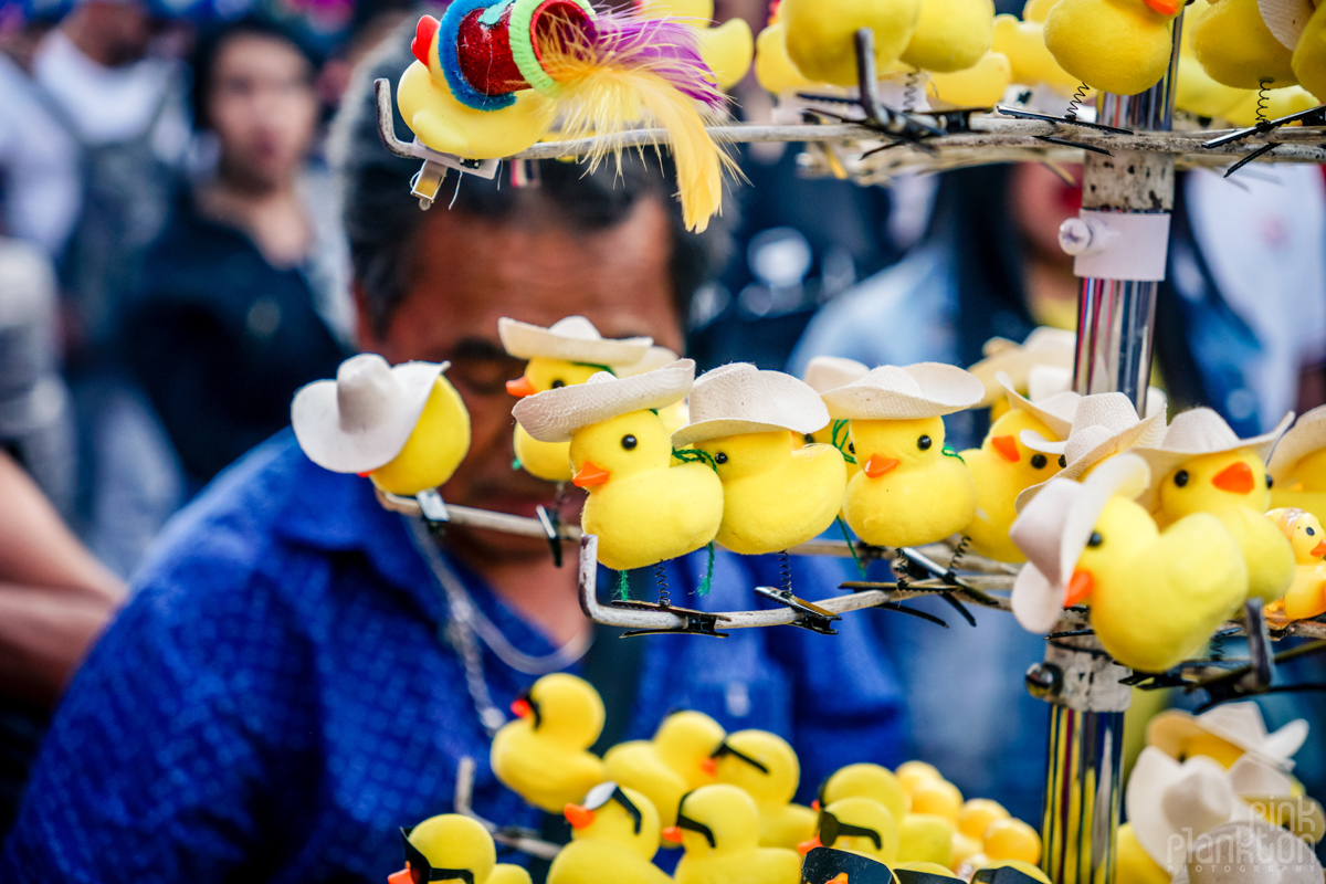 Man selling duck clips at the Bulls of FIre Festival in Mexico