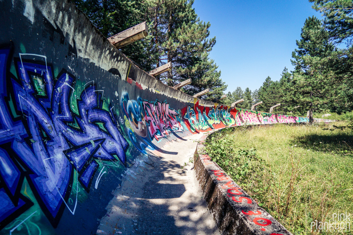 Graffiti on abandoned bobsled track in Sarajevo