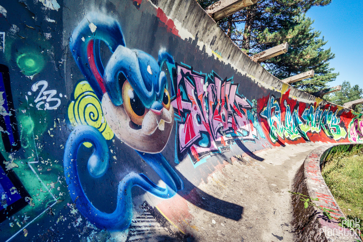 Graffiti on abandoned bobsled track in Sarajevo