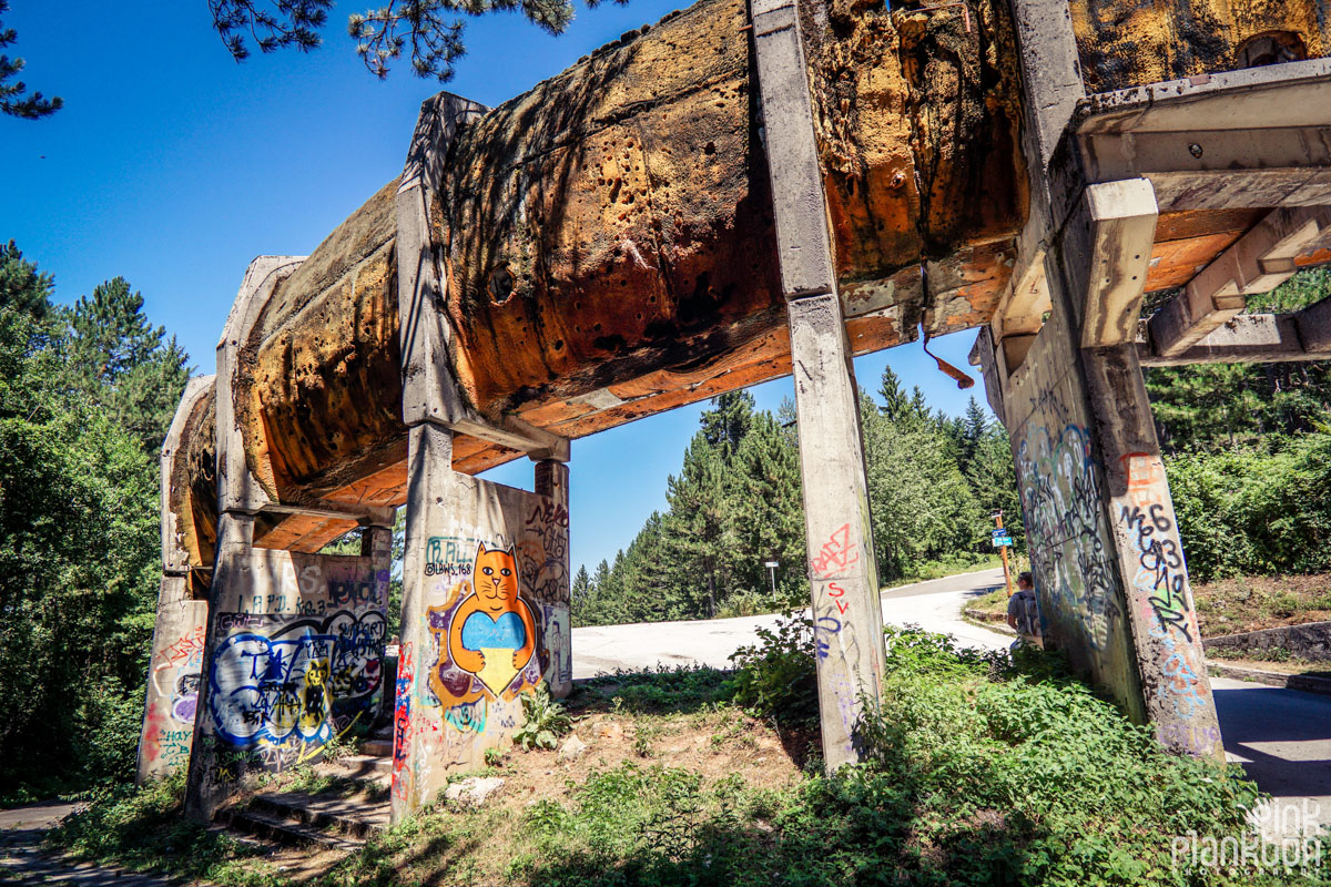 Graffiti on abandoned bobsled track in Sarajevo