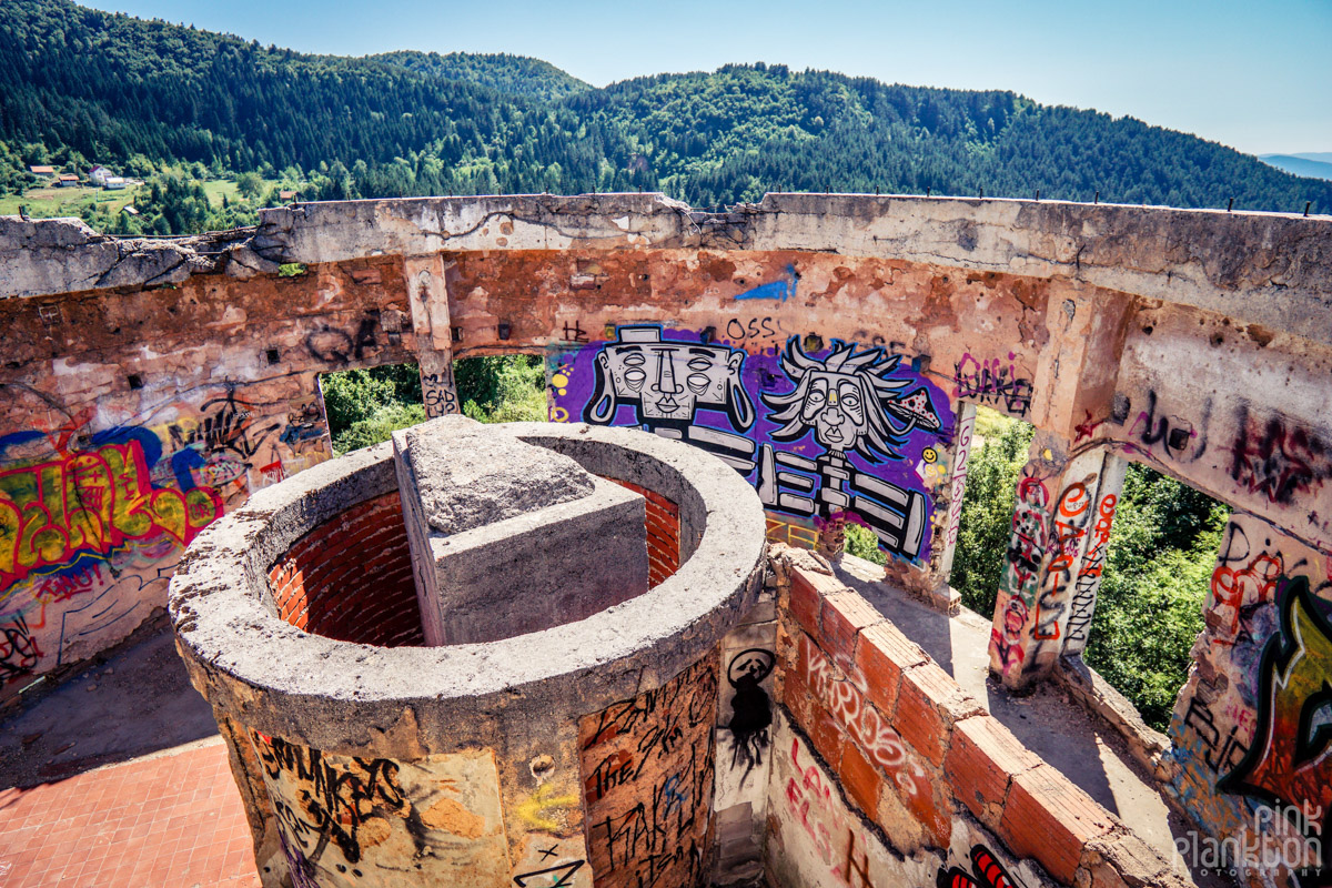 View of street art and graffiti on abandoned walls of Bistrik Tower in Sarajevo