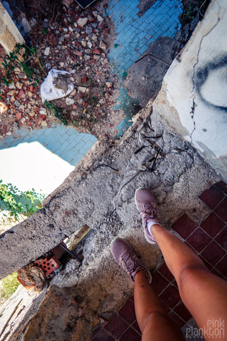 Person standing on abandoned Bistrik Tower in Sarajevo