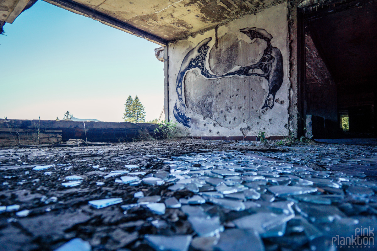 Street art and broken glass in abandoned Hotel Igman in Sarajevo