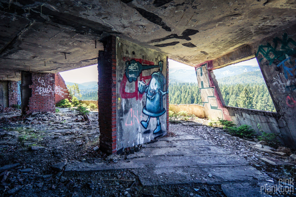 Street art and mountains from abandoned Hotel Igman in Sarajevo