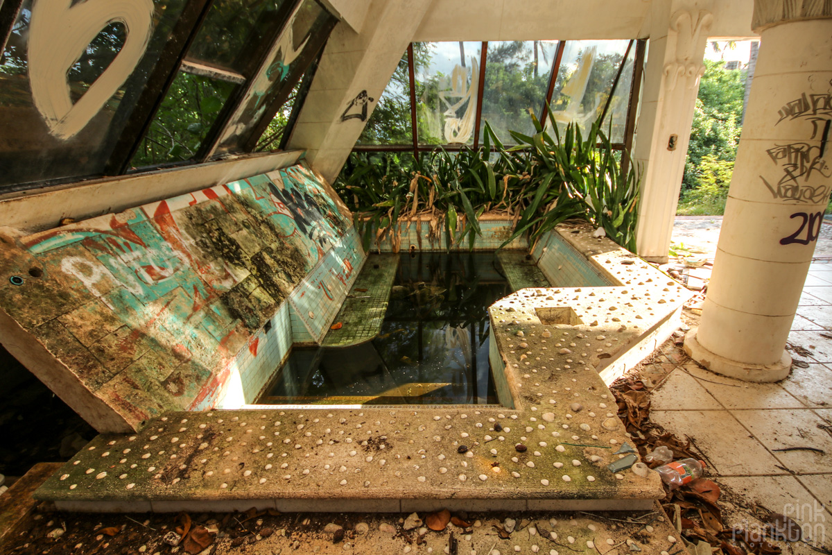 pool inside abandoned pyramid mansion in Playa del Carmen Mexico